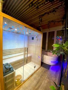 Capsule Wellness - sauna - balneo - machine de sport privatif - PS5 - 2 chambres
