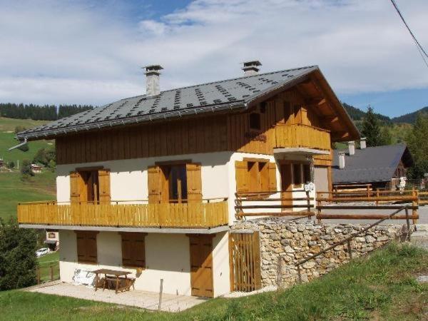 Appartement Chalet Les S'Nailles - Appartement 3 pièces dans chalet pour 6 personnes Chalet Les S'Nailles 174 route du Coin 73590 Notre-Dame-de-Bellecombe