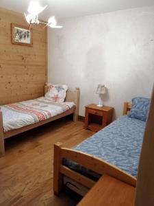 Chalet montagnard , 2 chambre ,70m2 ,navette gratuite