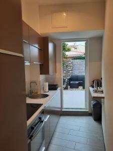 Charmant 2 pièces avec jardin privé - bord de mer