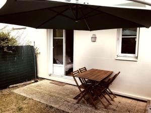 Charmant studio et son jardin