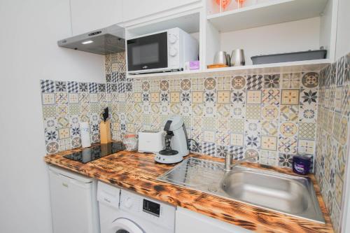 Charmant T2 en COEUR de VILLE - 2 lits + lit bébé - Wifi - Imprimante