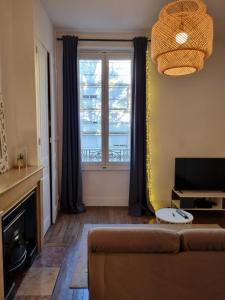 Chez Mima, paisible T2 rénové avec garage gratuit et local vélos