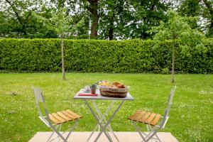 Chic Appartement avec Terrasse, Parking Privatif
