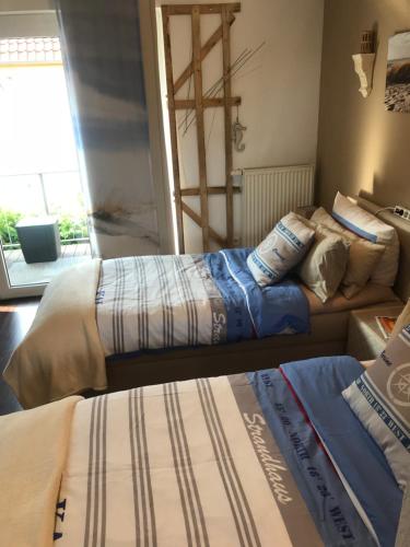 Christinas Strandhus mit Balkon und Strandkorb und Parkplatz