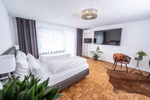 City Wohnung FN L 5 KLIMATISIERT mit Balkon und Küche