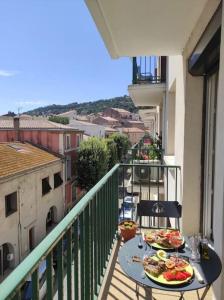Cocon traversant deux balcons proche centre