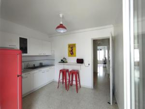 Cocon traversant deux balcons proche centre
