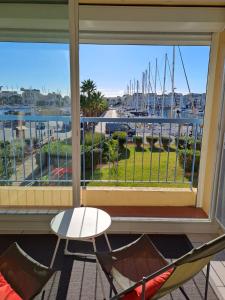 Cocoon with balcony and view on the port