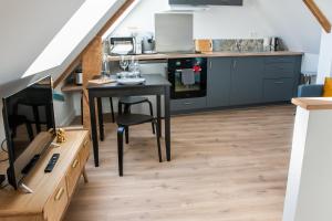 Appartement Confortable T1bis rénové, au cœur d'un bourg calme 12 Rue Principale 56500 La Chapelle-Neuve Bretagne