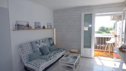Coquet T2 climatisé, véranda vue mer, Le Caounil, St Pierre la Mer