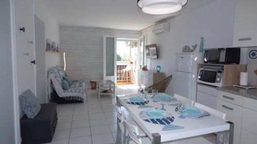 Coquet T2 climatisé, véranda vue mer, Le Caounil, St Pierre la Mer