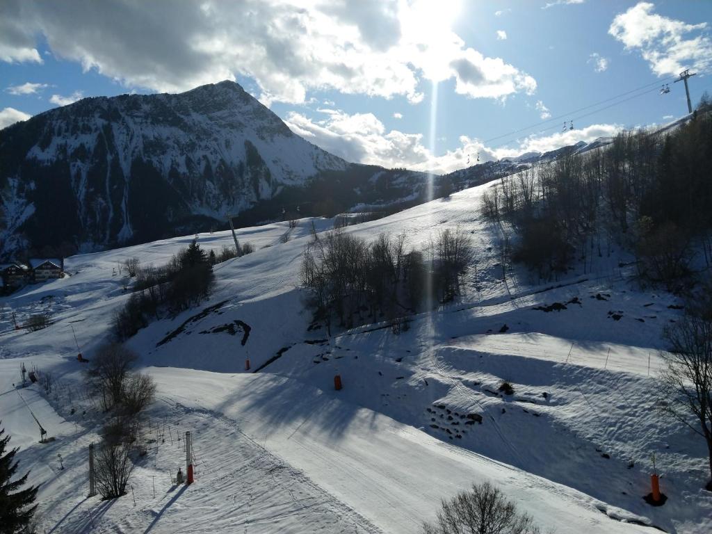 Corbier centre 32m2 balcon Sud vue pistes Vostok 9e étage Classé Tourisme et Label Qualité Hébergement déco Savoie Le Corbier, 73300 Le Corbier