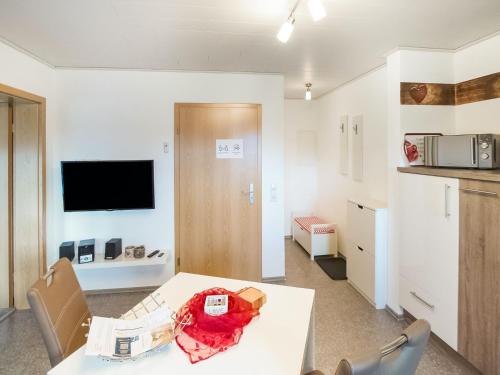 Cosy apartment with terrace and garden access in a quiet wooded area