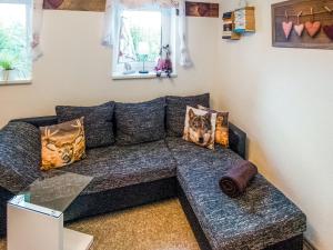 Cosy apartment with terrace and garden access in a quiet wooded area