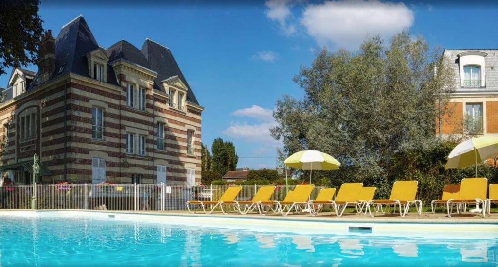 Cosy appartement dans une villa avec piscine, proche du centre et de la mer 2 Avenue Roi Pierre 1er de Serbie, 14390 Cabourg