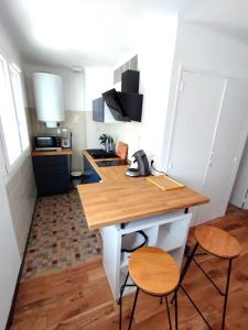 Cosy studio en étage résidence front de mer
