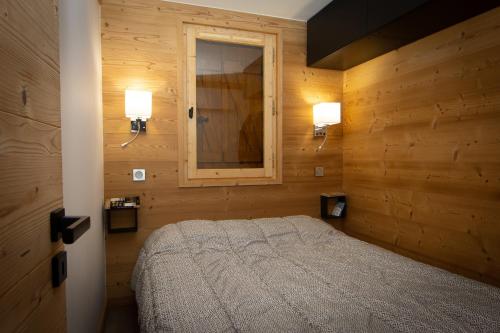 Courchevel 1550 - SUPERBE appartement SKIS AUX PIEDS !