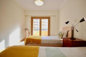 Cozy Red Telheiras Apartment