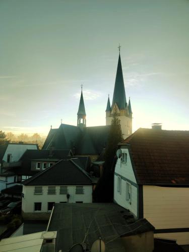 Dachgeschosswohnung mit Klimaanlage in bester Lage