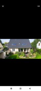 Dachgeschosswohnung Scharbeutz mit Garten