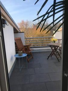 Dachgeschosszimmer mit Terrasse