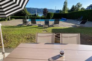 Das Schneckenhaus - Ferienwohnung mit Pool & Seeblick
