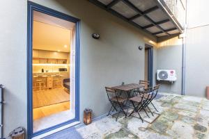Downtown Studio w/ AC & Patio by LovelyStay