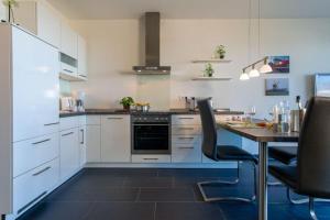 Duenenpark-Heiligenhafen-Haus-Meerduene-Wohnung-Deck-8