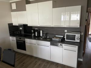 Dünenpark Binz - Komfortplus Appartement mit 1 Schlafzimmer und Balkon im Obergeschoss 017
