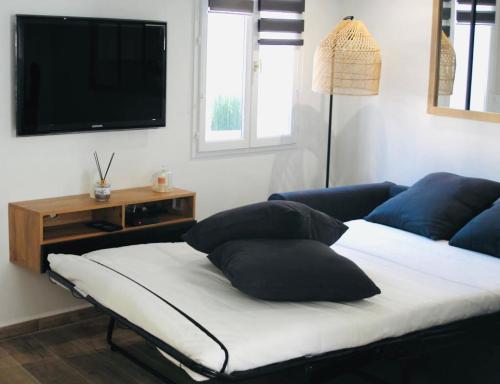 Duplex atypique rénové en plein centre du village