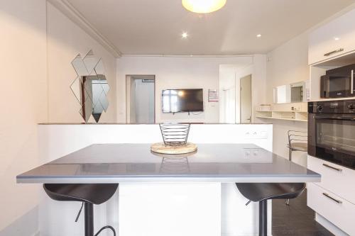 Duplex lumineux 4p proche du centre