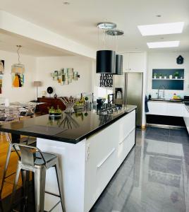 DUPLEX - PLEIN CENTRE AVEC UNE GRANDE TERASSE