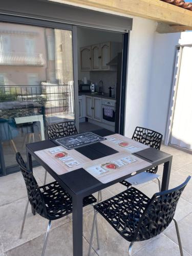 Duplex T3 terrasse vue mer climatisé plein centre