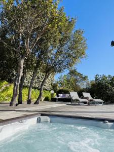 Appartement F2 avec jacuzzi, pétanque, à 3 min mer, dans grande propriété Route des Cannes 20166 Porticcio Corse