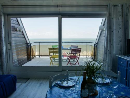 Face à la mer : appartement lumineux