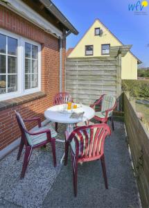 Familienhaus im Dorfgroden 27 Ferienwohnung Kompass