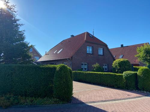 Ferien im Wangerland Ferienwohnung MUSCHEL Minsen Schillig Hund Pool Sauna