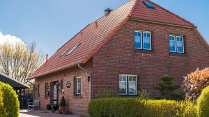 Ferien im Wangerland Ferienwohnung MUSCHEL Minsen Schillig Hund Pool Sauna