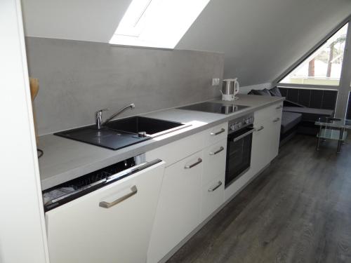 Ferienanlage Haus hinter den Dünen App 5 DG 2
