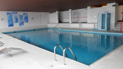 Ferienappartement mit Schwimmbad und Alpenblick