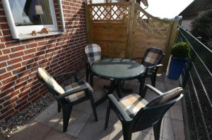 Ferienhaus Lobbe - Wohnung 04 mit Terrasse strandnah
