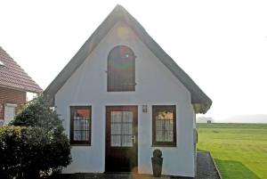 Ferienhaus mit Reetdach am Lobber