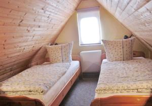 Ferienhaus mit Reetdach am Lobber
