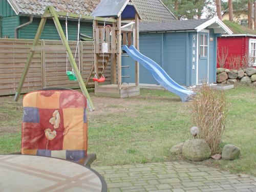 Ferienhaus Morgenstern F403 mit Kamin und Garten