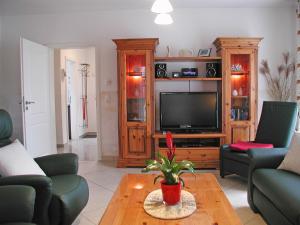 Ferienhaus Morgenstern F403 mit Kamin und Garten