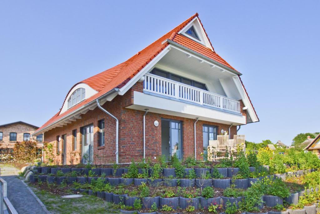 Ferienhaus Zaunkönig FeWo EG Terrasse und Garten, etwas Meerblick Boddenstraße 38, 18586 Groß Zicker