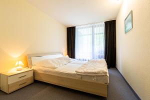 Appartement Ferienwohnpark Immenstaad am Bodensee Zwei-Zimmer-Apartment 55 13 Gehrenbergstr. 50 88090 Immenstaad am Bodensee Bade-Wurtemberg