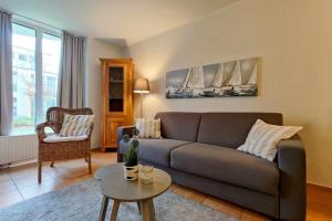 Ferienwohnung-11-mit-Terrasse-und-Strandkorb-am-Strand-Haus-Hohe-Worth-Duhnen