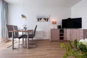 Ferienwohnung-47-mit-Schwimmbad-Sauna-Residenz-Passat-Doese